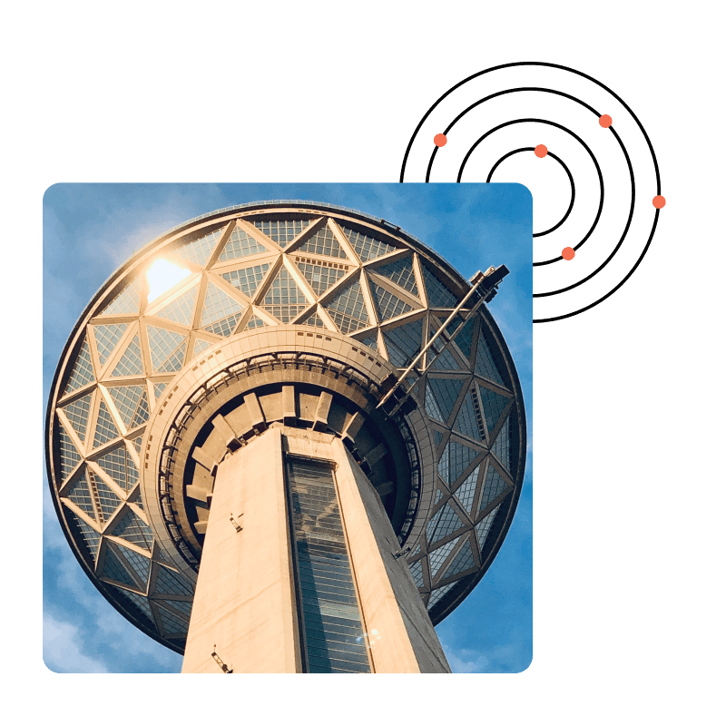 A low angle shot looking up at an ATC tower