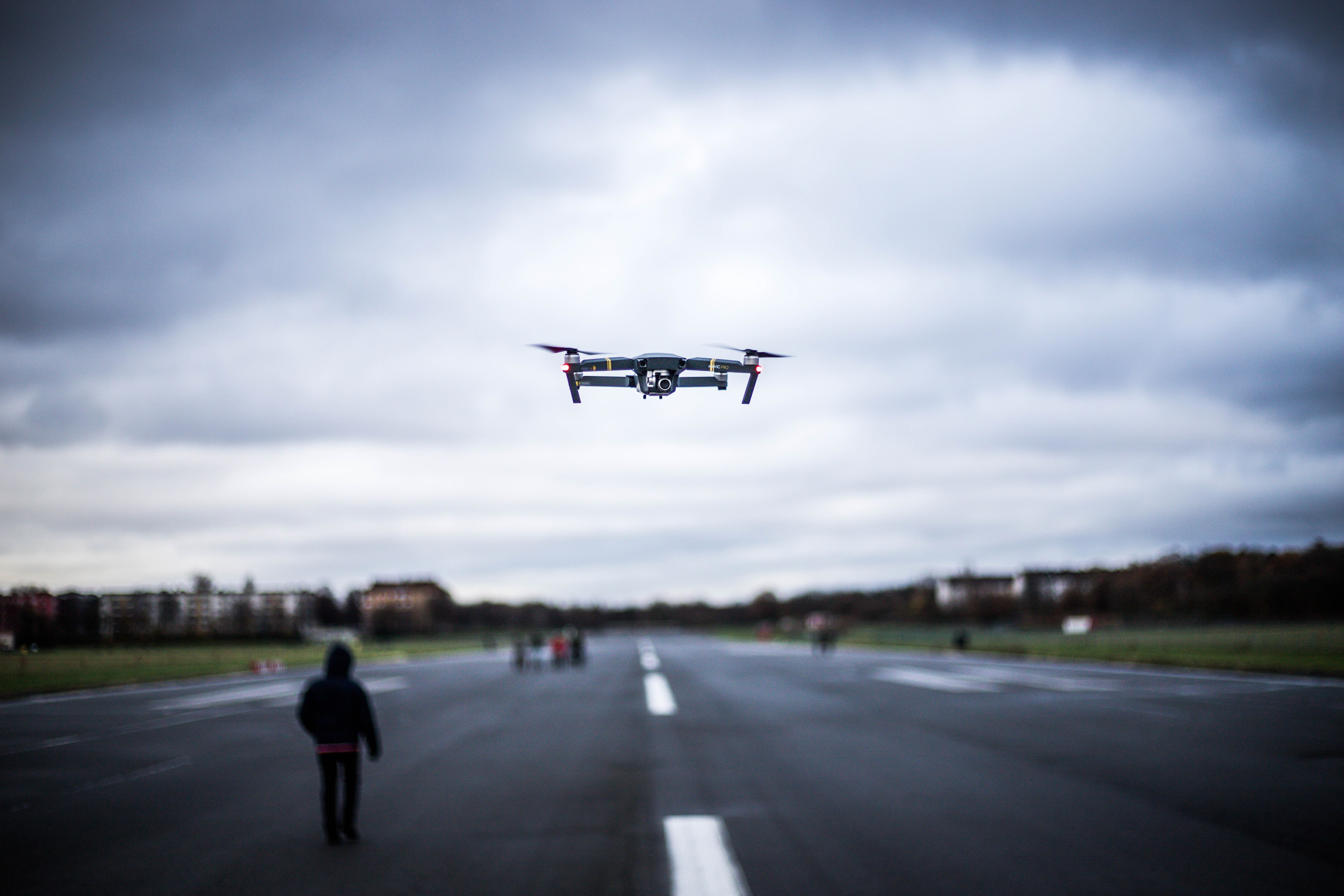 Drone over an airport's runway.