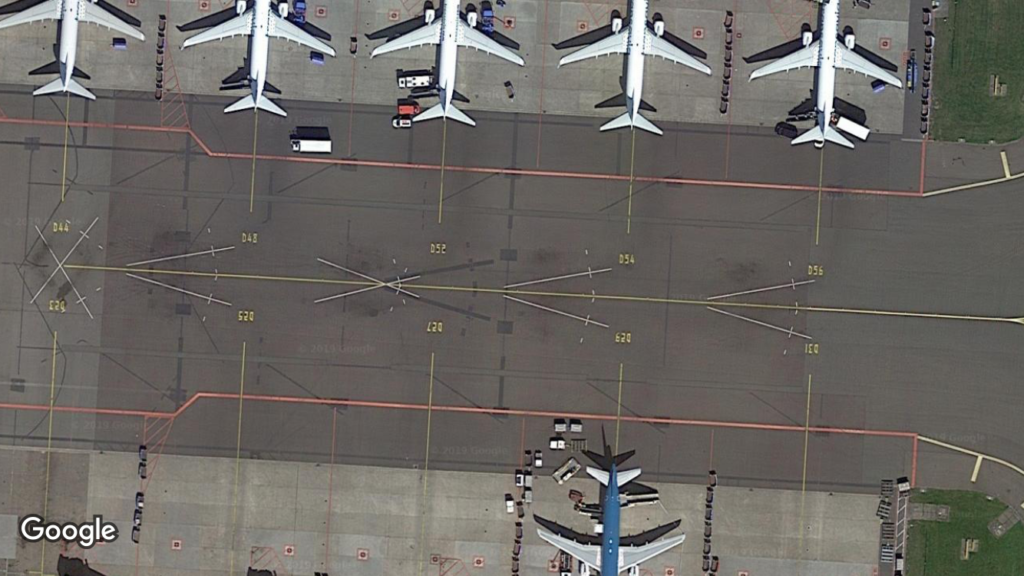 An aerial Google maps view of a taxiway at Amsterdam Schipol airport.
